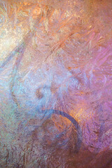 Naklejka premium Colored frozen window, background (texture)