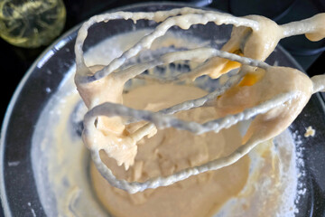 Baking Fun: Preparing Cake Batter with Mixer in Glass Bowl for Home Baking Projects
