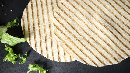 Lavash grill flatbreads tortilla ready to eat tasty snack fresh gourmet food background on table rustic food top view copy space