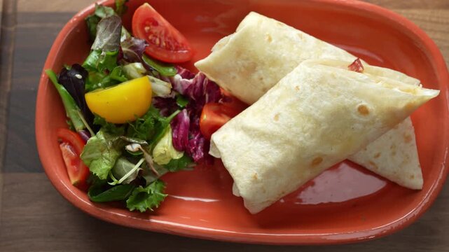 Delicious tortilla wraps served on a plate