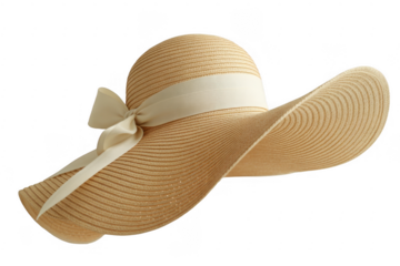 Wide brim straw hat with cream ribbon and bow isolated on a transparent background