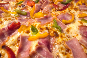 Delicious Ham and Pepper Pizza with Melted Cheese - Perfect for Italian Cuisine Lovers