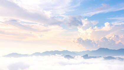 Serene Mountain Vista - A Dreamy Landscape of Clouds and Peaks.