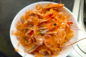 Shrimp Shells in Bowl: Culinary Waste and Seafood Ingredient Concept for Sustainable Cooking
