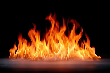Fototapeta premium Fiery Inferno: A vibrant dance of flames against a dark backdrop, with burning energy. capturing the essence of heat and power.
