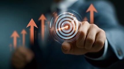 Business person's hand interacting with a glowing digital target while surrounded by upward arrows, symbolizing achieving goals, strategy, ambition, and financial growth in a futuristic context