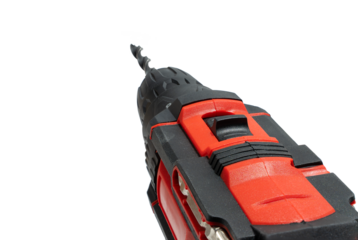 Angled close-up of cordless drill body and bit, PNG with transparent background. Dynamic perspective of rugged red and black power tool.