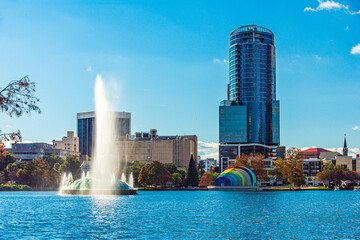Amazing view of Orlando skyline in Florida and reflection in Lake Eola.