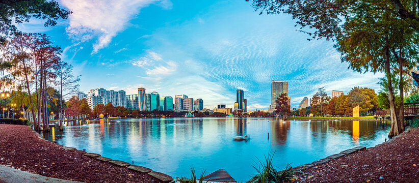 Amazing view of Orlando skyline in Florida and reflection in Lake Eola.