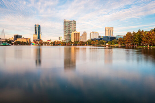 Amazing view of Orlando skyline in Florida and reflection in Lake Eola.