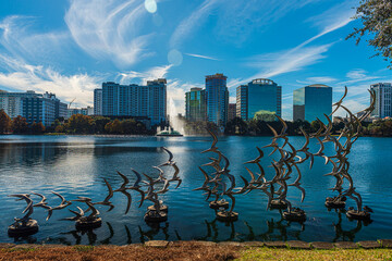 Amazing view of Orlando skyline in Florida and reflection in Lake Eola.