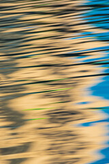 Textures of refletions and movement of waves in Water.