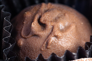 Brown delicious chocolate candy closeup