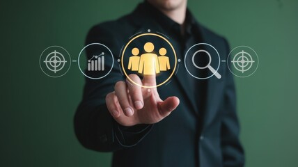 Businessman touching a glowing human resources icon in a virtual interface, representing recruitment, team building, and target audience selection