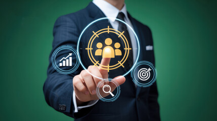 Businessman selects a target audience icon on a digital interface, focusing on marketing strategy and business growth