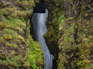 The waterfall Gljúfrabúi  in Iceland © wlad074