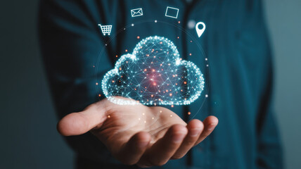 Businessman holding a glowing cloud icon, symbolizing cloud computing, global network connection, data storage, and digital technology