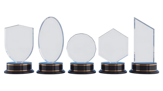 Set of diverse clear glass trophies and awards on bases