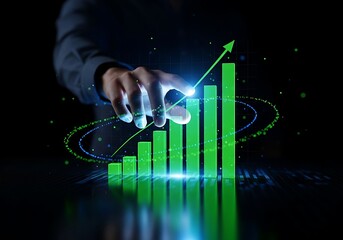 Business growth chart with hand pointing upward in a dark environment