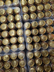 Beer cans. Aluminum beer cans in supermarket. Beer products on shop shelves