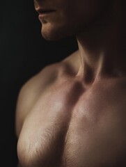 Naklejka premium Close-up portrait of a man's upper body. the focus is on his chest and neck, which is covered in a thick layer of skin. the skin appears to be smooth and well-defined.