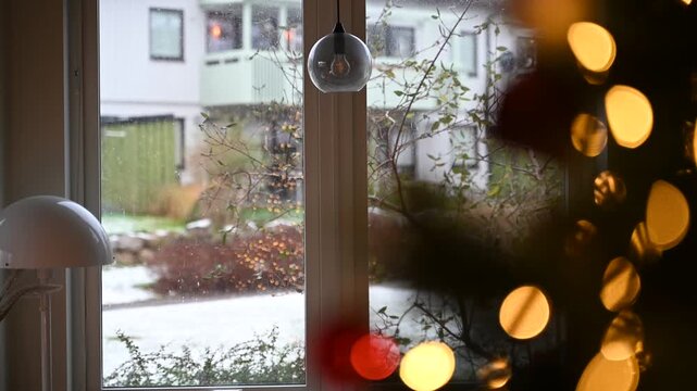 Snaw fall through window at christmas