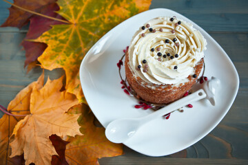 Cake and autumn leaves