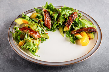 Tasteful leafy decoration complemented by cheese and balsamic glaze