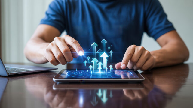 Man using a digital tablet to visualize business growth and success represented by glowing upward arrows
