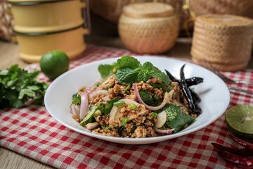 Spicy Minced Pork Salad, thai isan food, thai called Larb Moo	