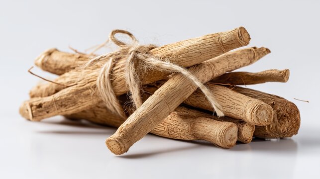 Dried herbal roots tied with string for natural remedies and health products