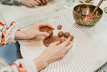 Female Hands Sculpting Clay – Traditional Pottery Workshop Art