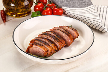Sliced duck breast baked with cherry