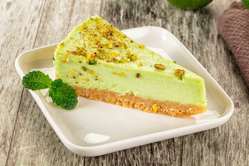 Green pistachio cheesecake served mint