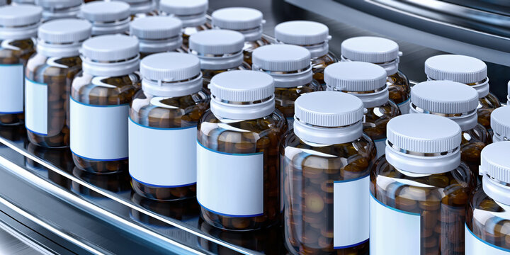 Pharmaceutical Production Line. Rows of glass medicine pill bottles with blank labels ready for custom text, on a industrial conveyor belt. Drug industry, manufacturing, quality control, logistics