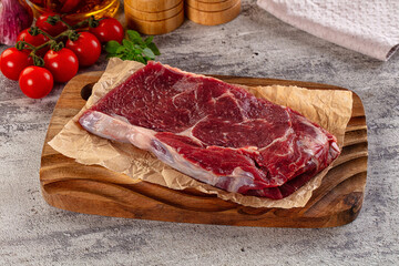 Gourmet raw rib eye steak