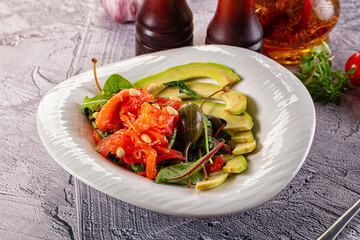 Dietary salad with salmon and avocado