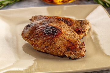 Roasted pork schnitzel steak piece