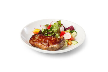 Delicious grilled beef steak serving with a side of colorful garden salad on a white plate