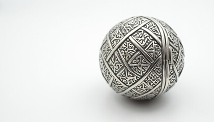 Silver sphere with geometric and arabesque ornamentation
