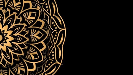 Golden mandala design on a black background with intricate