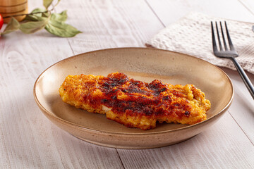 Roasted breaded crispy pork schnitzel