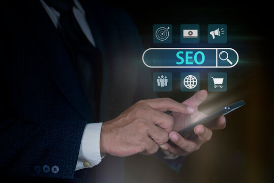 Businessman using smartphone with SEO search engine optimization concept. Digital marketing and search engine optimization. marketing Ranking traffic website internet business technology