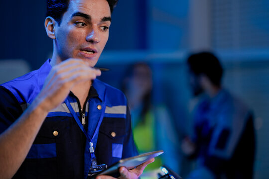 architect presents a digital blueprint for a future smart home. Using a tablet and AI, he plans a sustainable ESG real estate development and digital construction. - Powered by Adobe