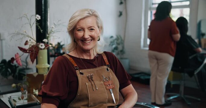 Face, happy woman and business owner in hair salon with pride, customer service and beauty professional. Portrait, hairdresser and mature entrepreneur laugh in startup, confident and client makeover