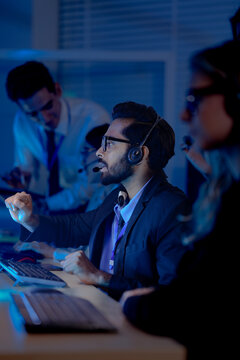 Future team lead headset guides human AI collaboration points screen AI generated insights predictive models refine strategy achieve optimal performance augmented intelligence workflow activates now b