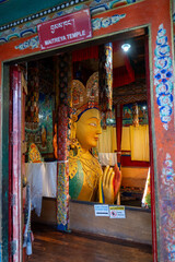 Thiksey, India - September 12, 2024: A 15-meter-tall statue of the Maitreya Buddha at Thiksey Monastery