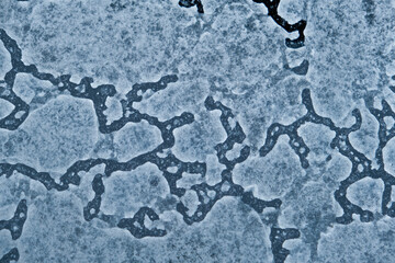 abstract texture of frozen wet dust and dirt on window glass