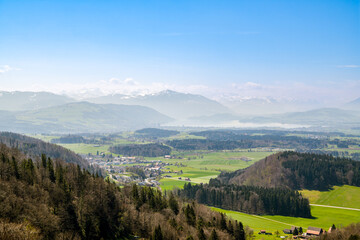 View on beautiful swiss landscape and Alps as seen from Albishorn peak near Zurich