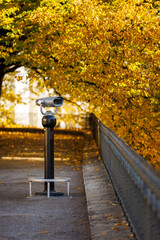 Sight seeing binoculars at a viewing platform in autumn colors in Tallinn, Estonia